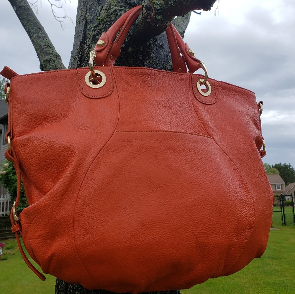 Kenar tangerine orange leather handbag